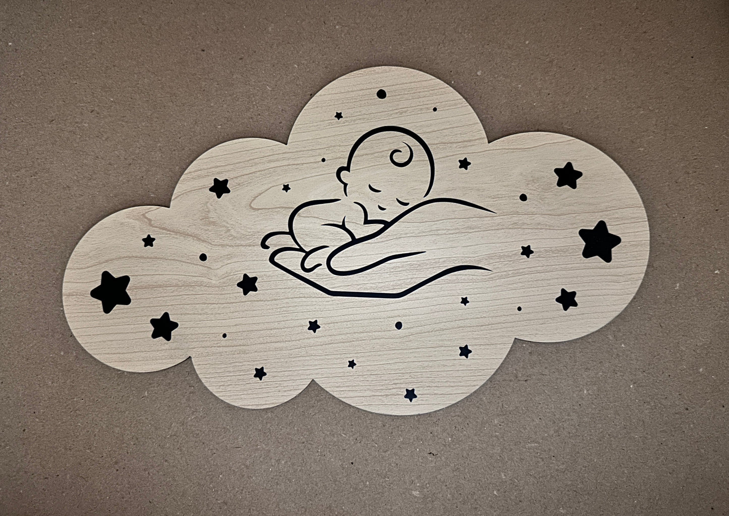 Wandplaatje met slapende baby op hand Speksnijder Laser Service